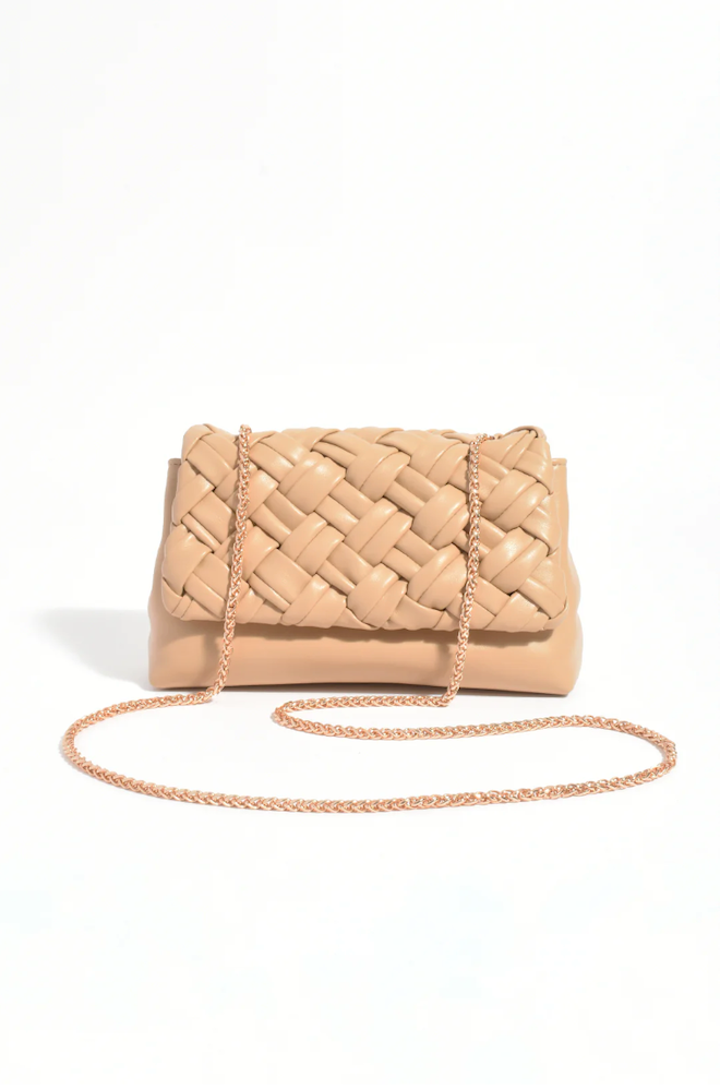 Beige woven handbag with a chain strap on a white background