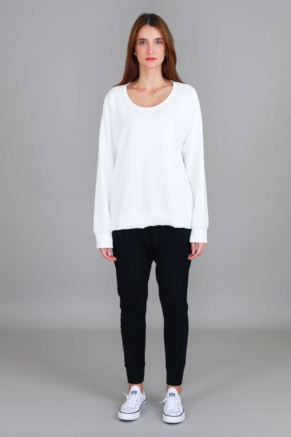 Ulverstone Sweater - White styled with black joggers, front view