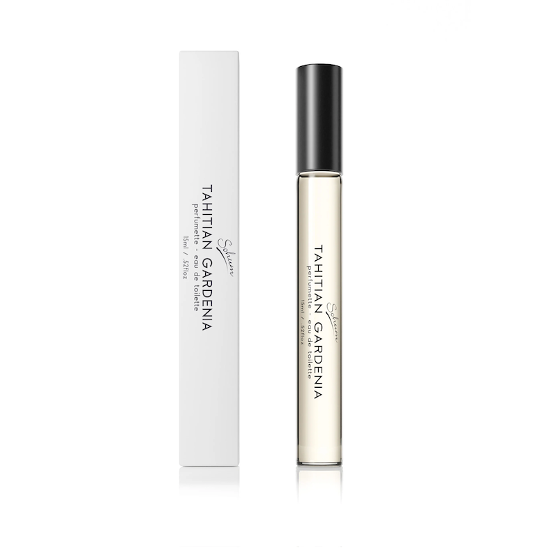 A 15mL perfume bottle with a metal rollerball applicator, accompanied by its white box, displaying the name 'Tahitian Gardenia'.