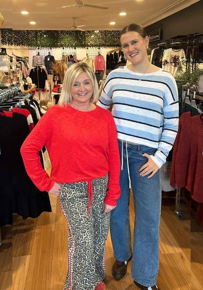 Little Lies Hailey Drawstring Top shown in Red and Blue Stripe, styled in-store — also available in White at Kat and Ko Clothing