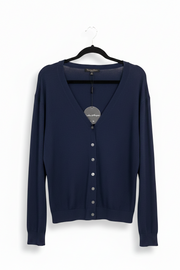 Kat and Ko Clothing Caroline Cardi in navy blue with a V-neckline and button-down front on a black hanger