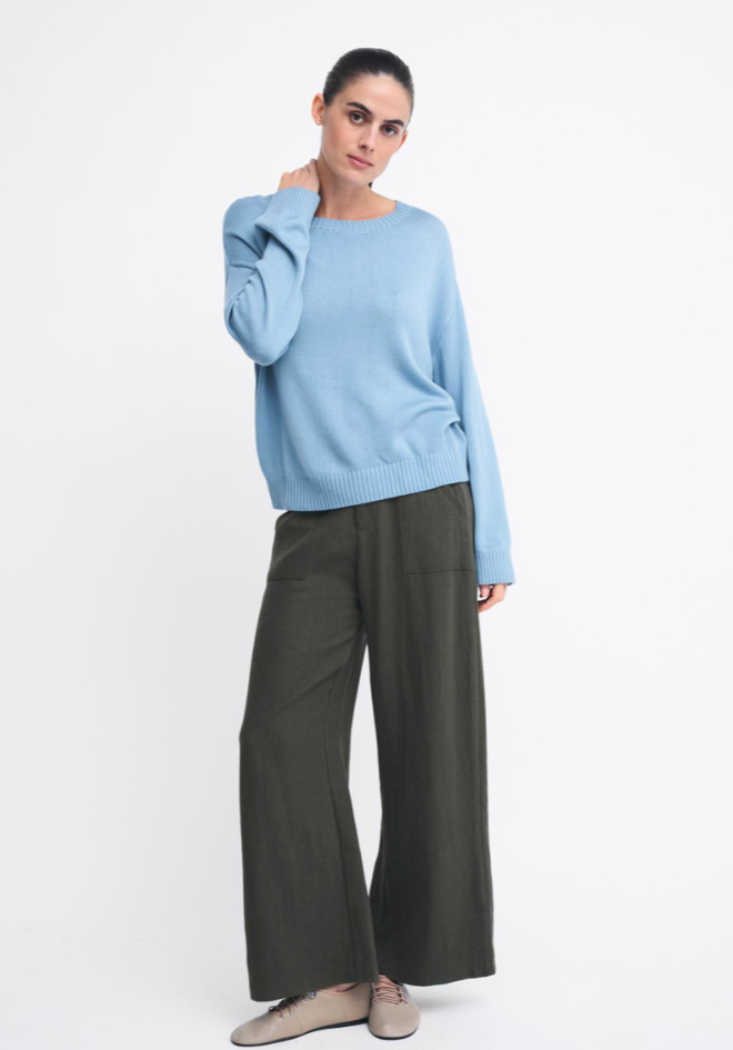 Victoria Jumper in Baby Blue by Little Lies — full-length front view of soft baby blue knit with ribbed neckline and hem, styled with wide-leg khaki trousers and ballet flats, available in Australia at Kat and Ko Clothing