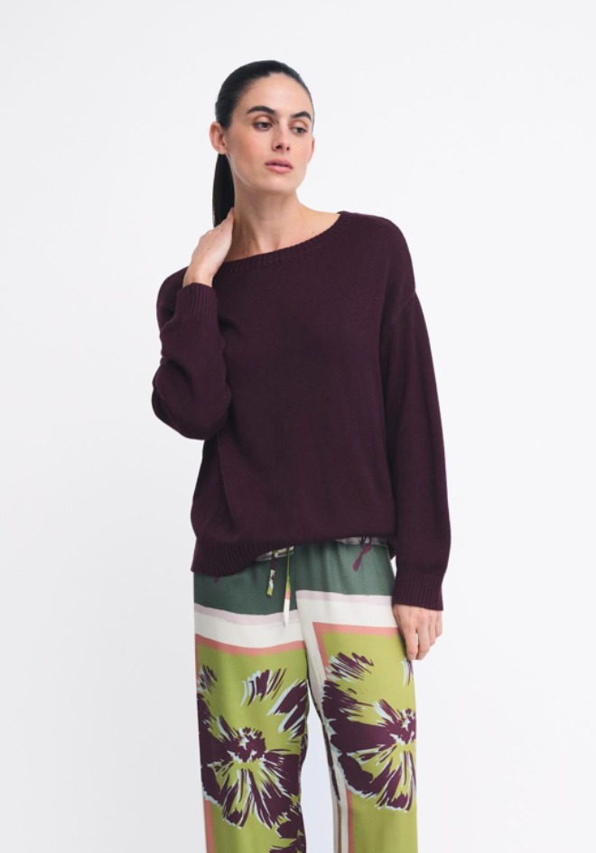 Victoria Jumper in Burgundy by Little Lies — studio front view of deep burgundy lightweight knit jumper with wide boat neckline and ribbed hem, styled with green and yellow floral wide-leg pants, available in Australia at Kat and Ko Clothing
