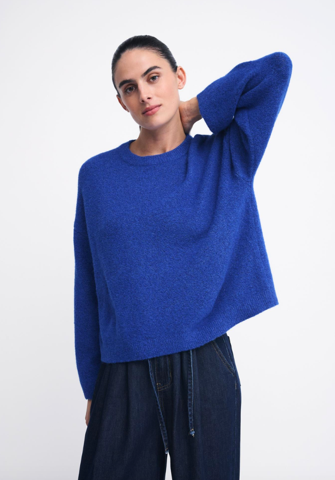 Otto Knit in Cobalt by Little Lies — studio front view of bold cobalt blue relaxed boxy crew neck knit with dropped shoulders and slightly cropped length, styled with dark navy wide-leg drawstring pants, available in Australia at Kat and Ko Clothing