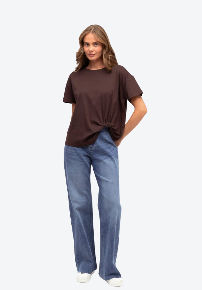 Label of Love Easy Tuck Tee - Dark Chocolate, full-length front view styled with blue jeans, available in Australia at Kat and Ko Clothing
