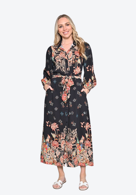 Woman wearing a floral dress on a white background