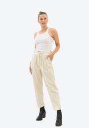 Hunter Cord Pants in Cream by Worthier — relaxed fit cream corduroy pants with elastic drawstring waistband, full length front view