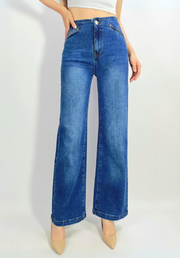 Blue jeans worn by a person on a white background