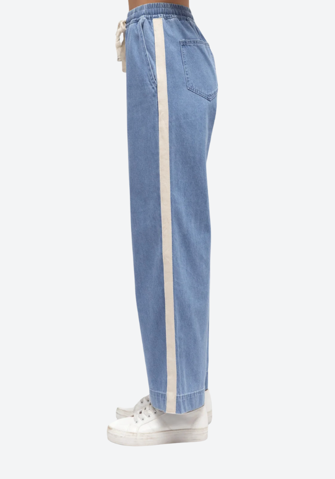 Light blue pants with a white stripe on a white background