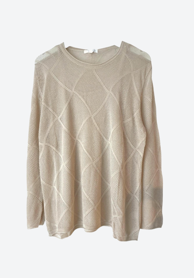 Beige sweater with a textured pattern on a white background