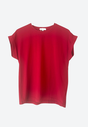 Red sleeveless top on a white background