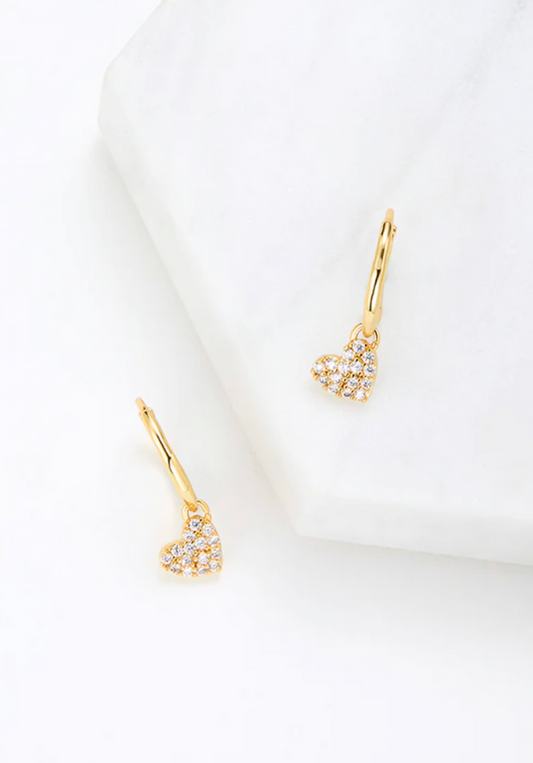 Gold heart-shaped earrings on a white background