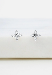 Butterfly-shaped earrings on a white background