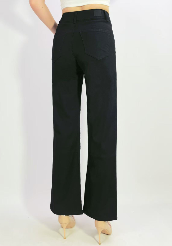 Black wide-leg pants worn by a person on a white background