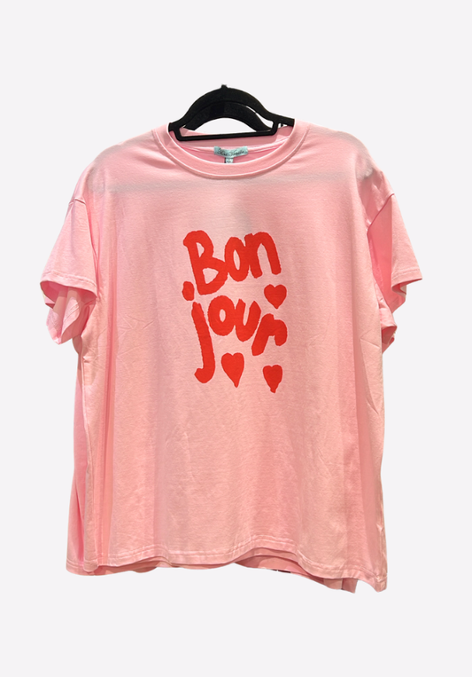 Pink t-shirt with 'Bon Jour' text and hearts on a white background
