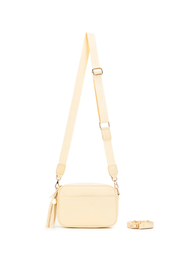 Yellow crossbody bag on a white background
