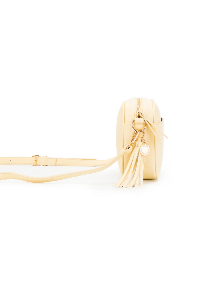 Gold handbag with a strap on a white background