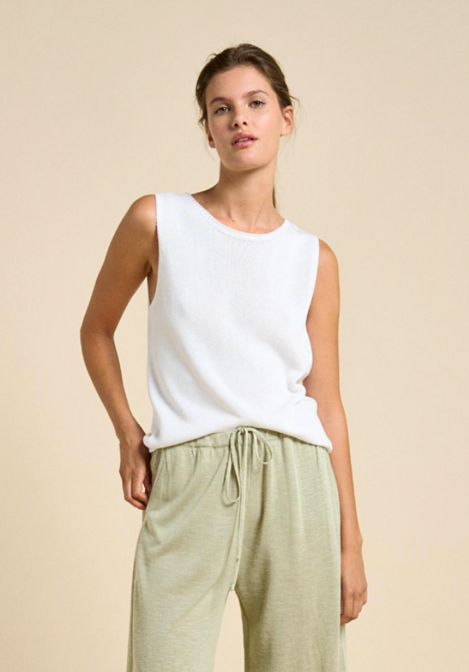 Spring Tank in White by Little Lies — front view of white knit sleeveless tank with round neck, styled with sage green drawstring pants, available in Australia at Kat and Ko Clothing