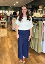 Linen Slip Skirt in Navy by Little Lies — 100% linen skirt with elastic waistband, full length front view on model