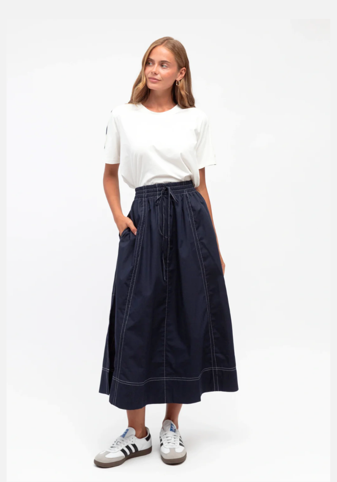Bella Midi Skirt Navy Label of Love — front view of navy polyester cotton midi skirt with elasticated waistband and white contrast stitch detail