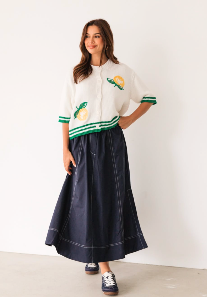 Bella Midi Skirt in Navy by Label of Love — full length front view of navy midi skirt with white contrast stitching and elasticated waist tie