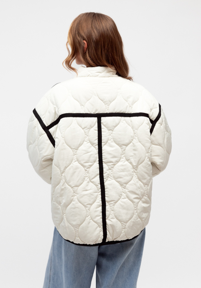 Label of Love Milano Puffer Jacket — back view of quilted puffer jacket with contrast black detail