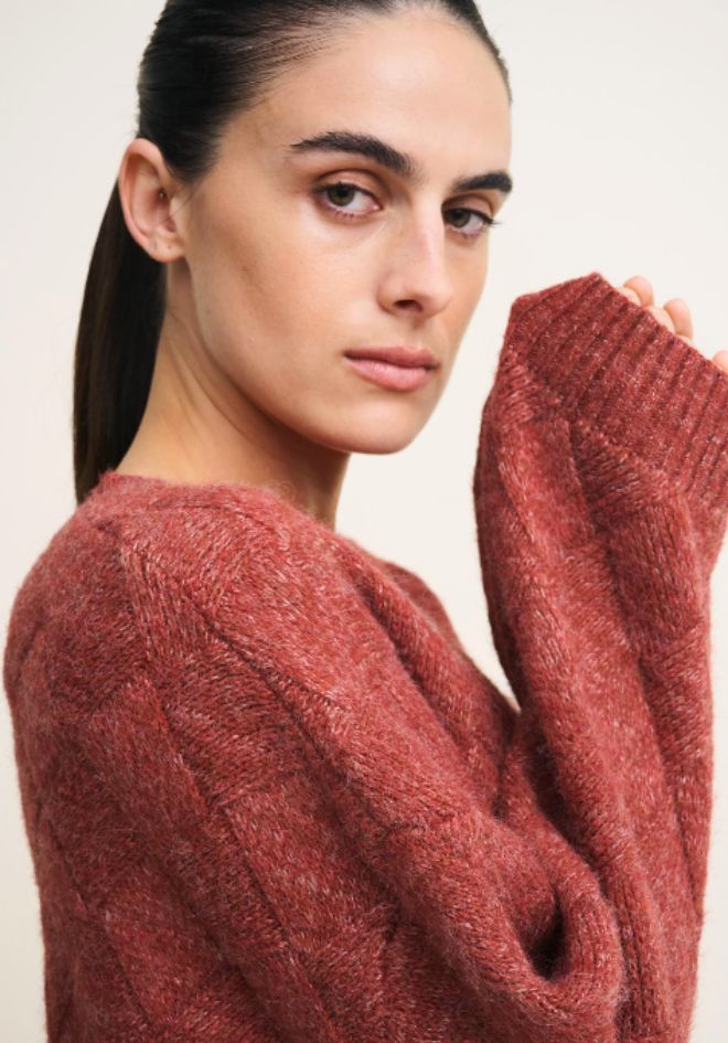 Little Lies Dylan Knit Terracotta — side close-up of subtle check design and soft fabrication on relaxed fit terracotta knit jumper