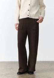 Lenni Barrel Leg Pants in Chocolate by Little Lies — cropped front view of dark chocolate brown wool blend barrel leg pants with patch pockets and drawstring waist, styled with cream fluffy button cardigan, shop in Australia at Kat and Ko Clothing
