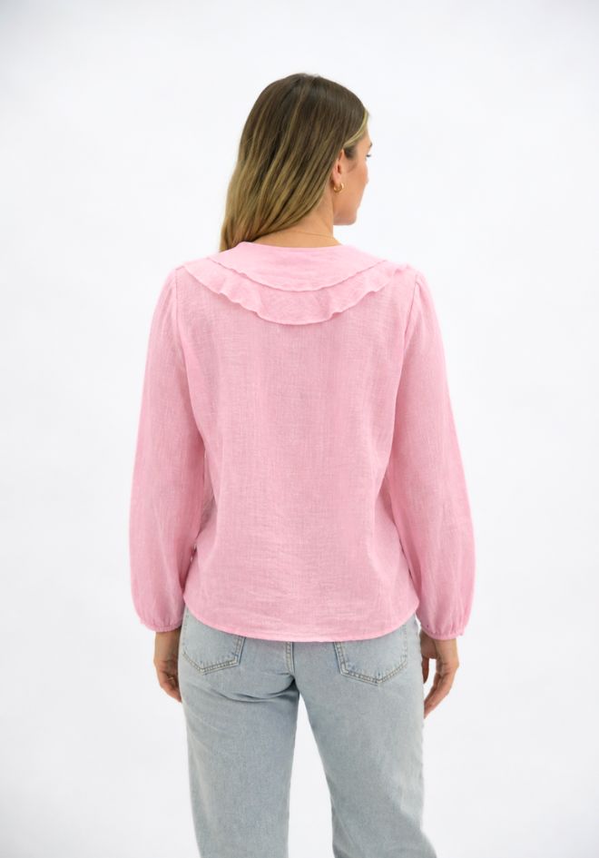 Worthier Claire Linen Blouse in Dusty Pink — back view showing relaxed linen silhouette with ruffle collar detail and balloon sleeves, styled with light wash jeans, available in Australia at Kat and Ko Clothing