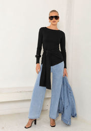 Veronique Top by Ave The Label — full-length front view of black long sleeve top with adjustable tie waist detail, styled with wide-leg light wash jeans and heels, available in Australia at Kat and Ko Clothing