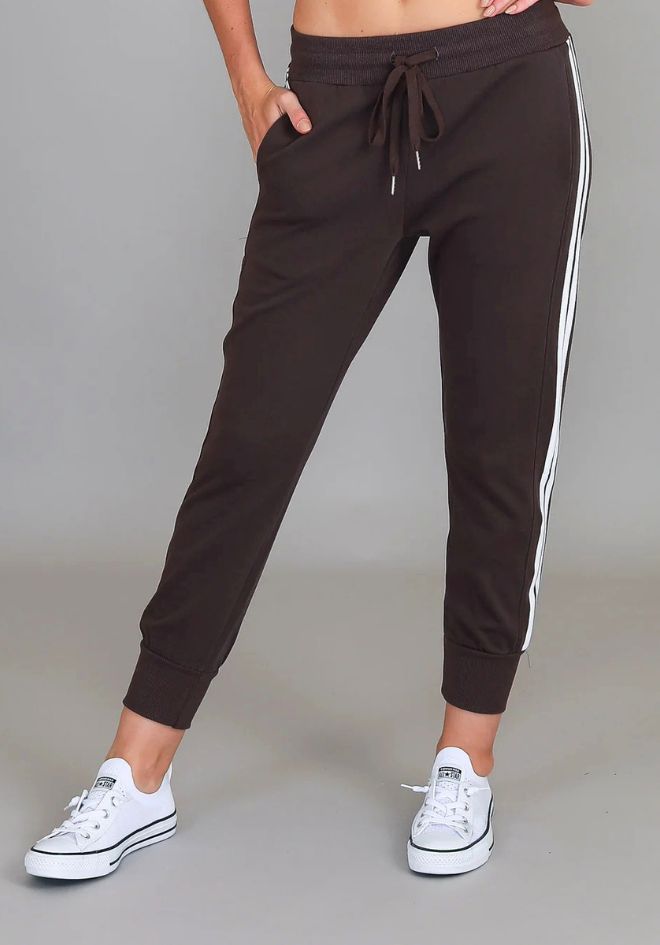 Pammy 3S Logo Sweatpants - Truffle by 3rd Storey The Label — close-up front view styled with white sneakers, available in Australia at Kat and Ko Clothing