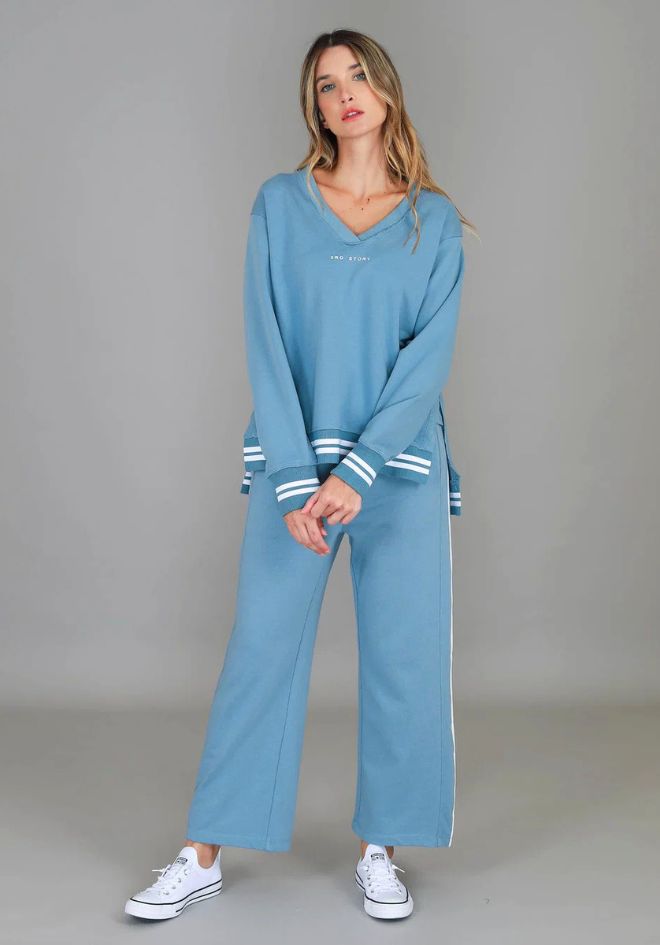 Pammy Stripe Straight Leg Sweatpants Cloud Blue by 3rd Storey The Label — front view styled with matching top and white sneakers, available in Australia at Kat and Ko Clothing