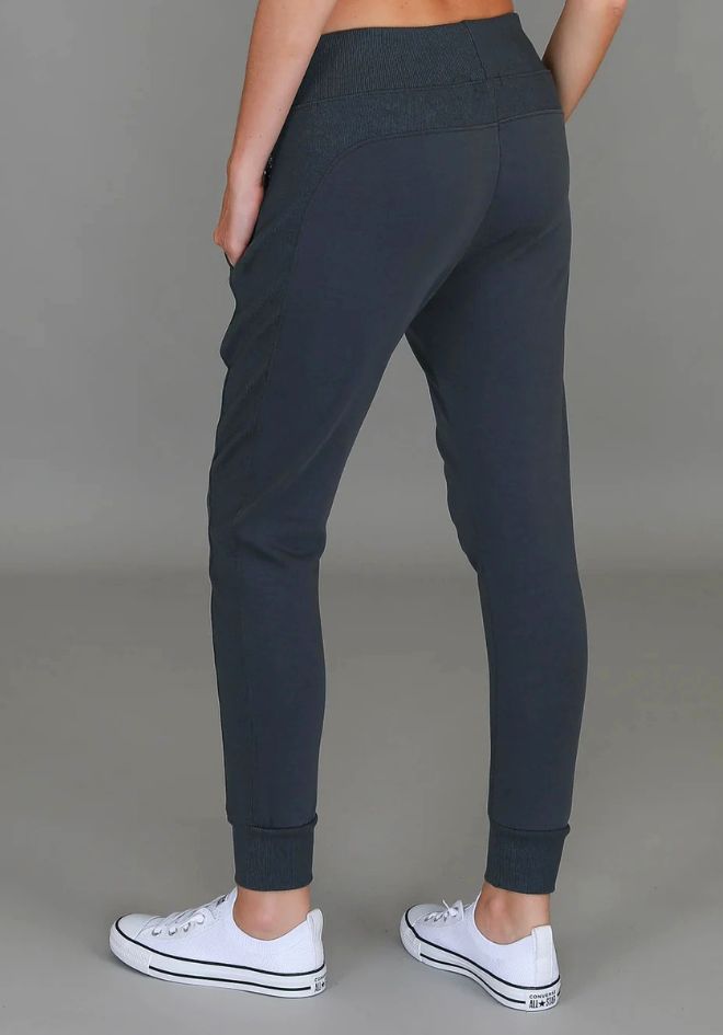 3rd Story The Label Byron Jogger Charcoal — back view of charcoal slim-fit jogger pants with ribbed waistband and cuffed ankles, styled with white sneakers, available in Australia at Kat and Ko Clothing
