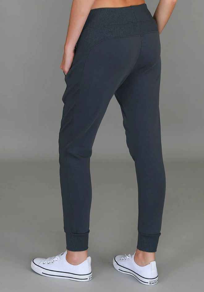 Byron Jogger Charcoal 3rd Story The Label — back view of charcoal cotton French Terry jogger with ribbed waistband and tapered ribbed ankle cuffs, styled with white sneakers, available in Australia at Kat and Ko Clothing