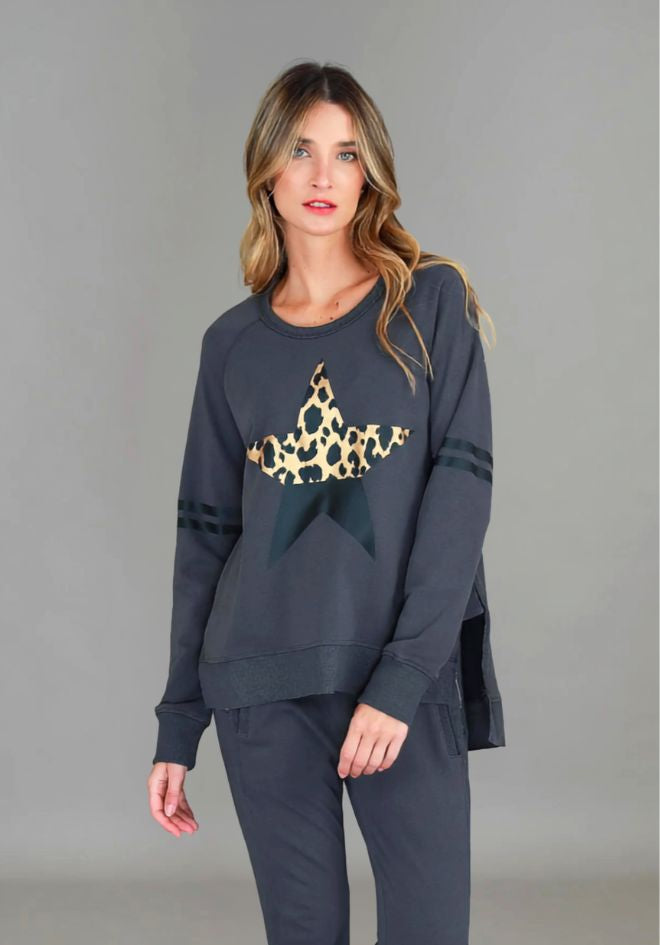 Ginger Leopard Star Sweater in Charcoal by 3rd Story The Label — front view of relaxed charcoal sweatshirt with gold leopard print star motif and stripe sleeve detail, styled with matching charcoal joggers, available in Australia at Kat and Ko Clothing