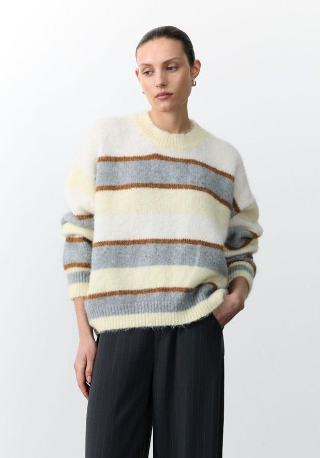 Little Lies Lizzi Sweater Grey — effortless grey knitwear styled with jeans for a casual everyday look