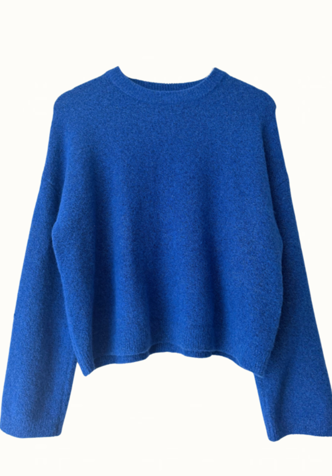 Little Lies Otto Knit Cobalt — flat lay of bold cobalt blue boxy crew neck knit with dropped shoulders, long sleeves and ribbed trim on collar, cuffs and hem, available in Australia at Kat and Ko Clothing