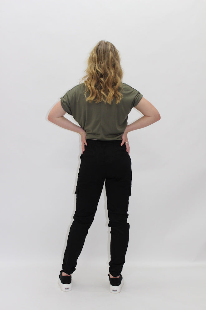 Chino Cargo Pants Wakee Jeans — back view of model wearing black pants with an olive green tee and black sneakers, available in Australia at Kat and Ko Clothing
